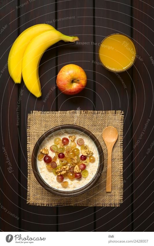 Oatmeal Porridge with Grapes and Walnuts Fruit Breakfast Juice Fresh food oat oatmeal porridge stirabout Cereal gruel milk Dairy Raw walnut healthy Meal grain