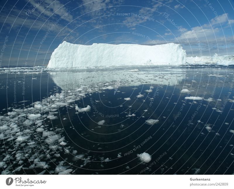 Ice Rocks Environment Nature Landscape Elements Water Sky Clouds Climate Climate change Beautiful weather Fjord Ocean Wanderlust Loneliness Iceberg Arctic Ocean