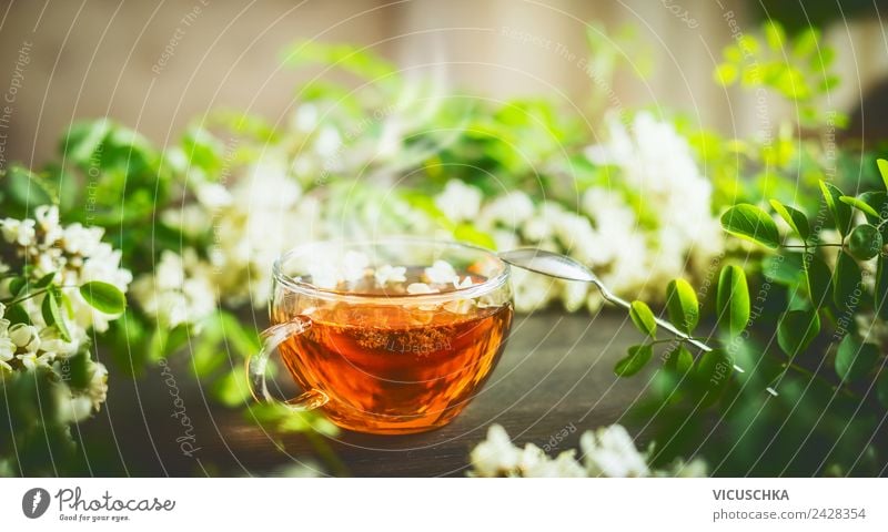 Cup with fresh herbal tea on the table Food Herbs and spices Nutrition Breakfast Beverage Hot drink Tea Lifestyle Design Healthy Alternative medicine