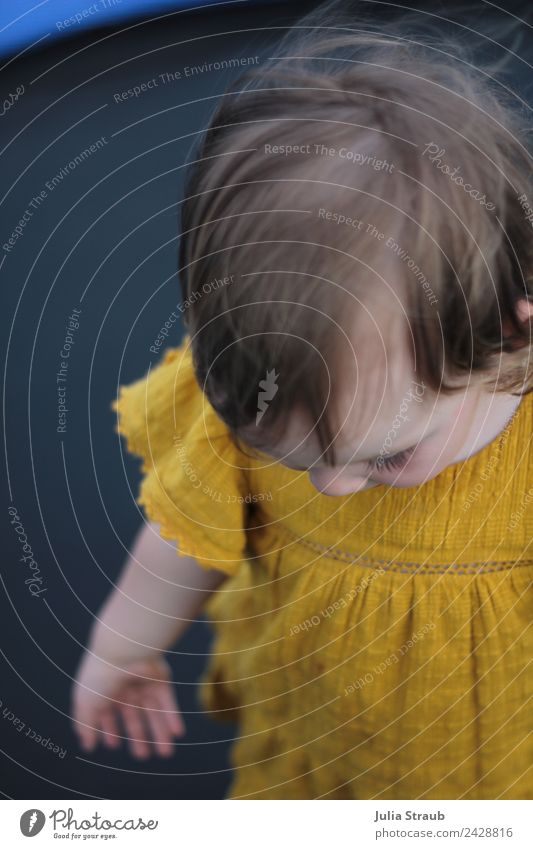 mustard yellow sad girl dress Feminine Toddler Girl 1 Human being 1 - 3 years Dress Brunette Stand Yellow Black Sadness Colour photo Exterior shot Day