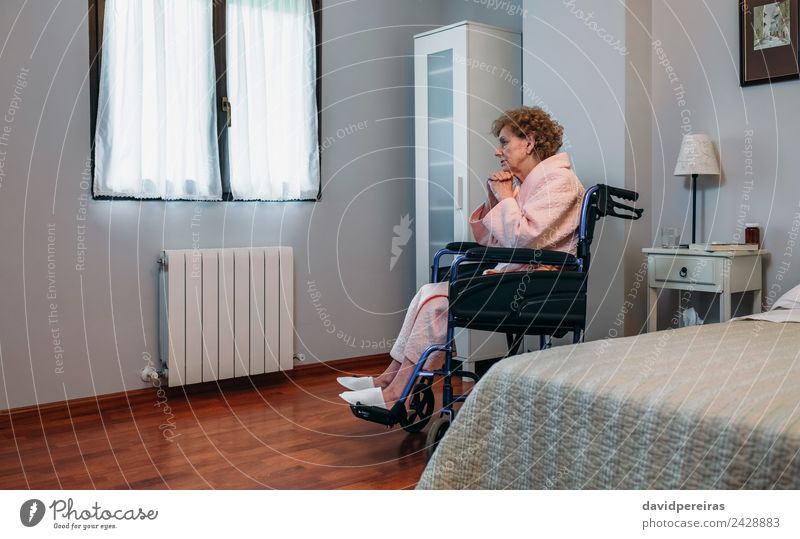 Senior woman in a wheelchair alone Lifestyle Health care Illness Medication Relaxation Hospital Human being Woman Adults Old Sit Sadness Authentic Hope