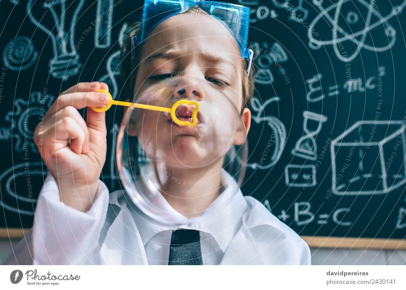 Kid doing soap bubbles against of drawn blackboard Joy Happy Playing Flat (apartment) Science & Research Child School Classroom Blackboard Laboratory