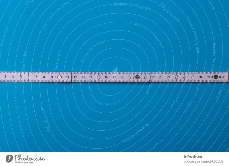 folding rule Craftsperson Craft (trade) Construction site Measuring instrument Blue White Conscientiously Accuracy Metre-stick Measure House building Build Line