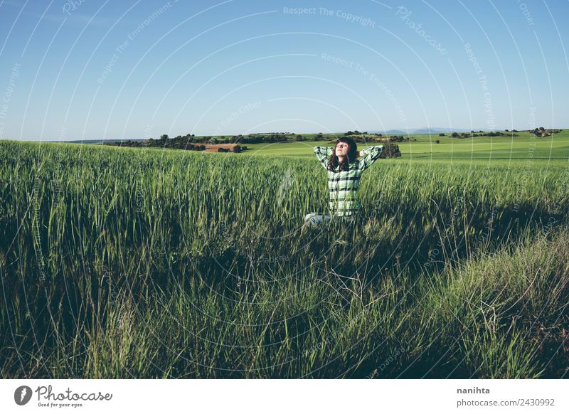 Young woman enjoying the day in a green field Lifestyle Style Joy Healthy Wellness Harmonious Well-being Senses Relaxation Vacation & Travel Adventure