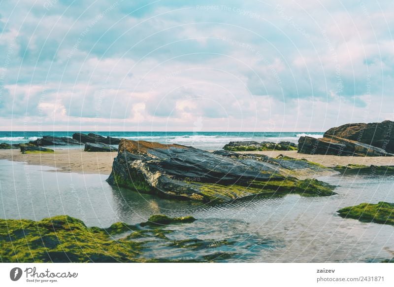 Beach with rocks and puddle in a sunset, ribadeo, lugo, galician, spain Exotic Vacation & Travel Tourism Ocean Island Waves Nature Landscape Sand Horizon