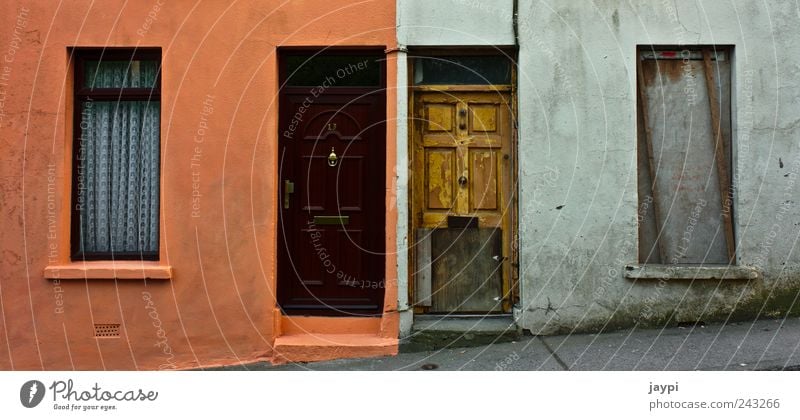 contrasts Cork House (Residential Structure) Wall (barrier) Wall (building) Facade Window Door Old Dirty Sharp-edged Hideous Broken New Clean Beautiful Converse