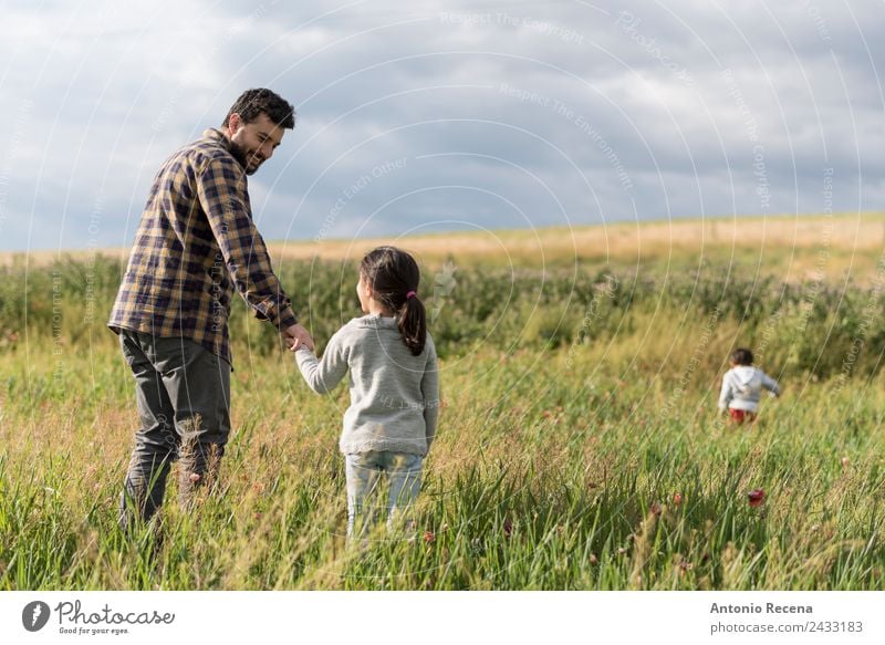 fathers path Playing Child Baby Toddler Girl Boy (child) Man Adults Parents Father Brothers and sisters Family & Relations Infancy Flower Meadow Embrace