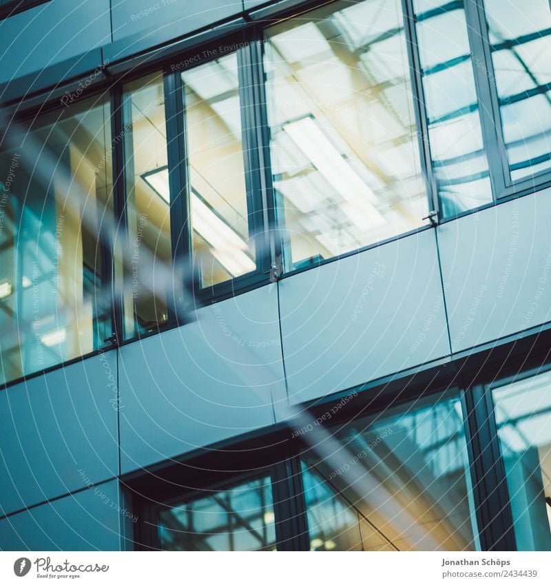 mirrored facade of an office building Office work Workplace Economy Business Town Downtown High-rise Bank building Manmade structures Building Architecture