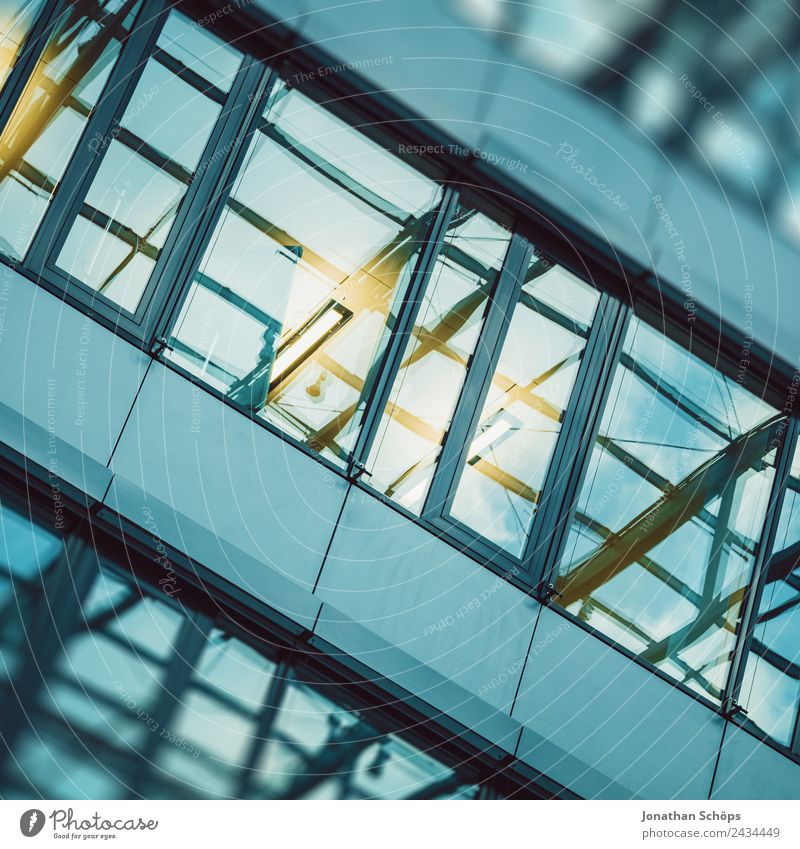 mirrored facade of an office building Town Downtown House (Residential Structure) High-rise Bank building Manmade structures Building Architecture Facade