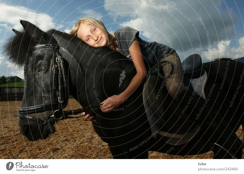 Two friends Leisure and hobbies Ride Equestrian sports Girl 1 Human being 8 - 13 years Child Infancy Animal Pet Farm animal Horse Embrace Happy Beautiful