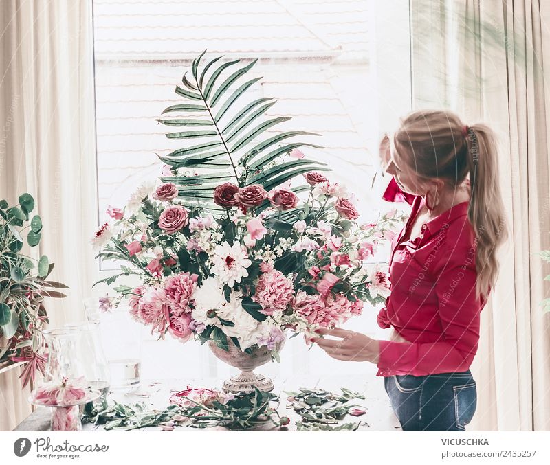 Florist woman arranges festive bouquet of flowers Lifestyle Style Beautiful Decoration Party Event Feasts & Celebrations Human being Woman Adults Plant Flower