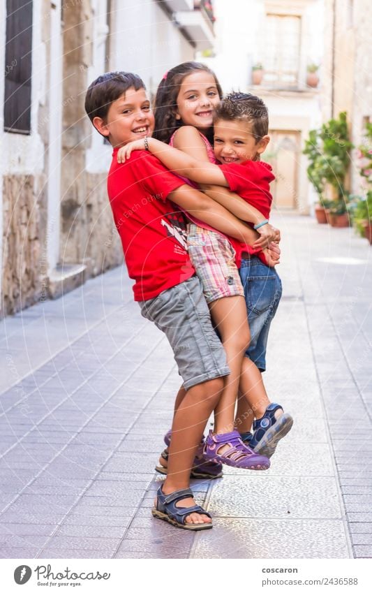 Three friends playingon the street at summer Joy Happy Beautiful Playing Summer Child School Boy (child) Friendship Infancy Hand Group Nature Sky Park Together