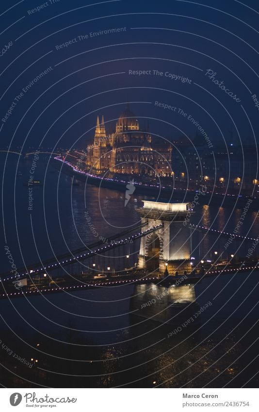 night view of the Danube river flowing through Budapest Vacation & Travel Tourism River Town Skyline Bridge Building Architecture Tourist Attraction Monument