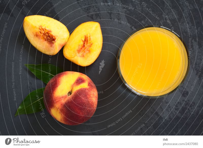 Peach Juice or Nectar Fruit Beverage Fresh food drink drupe Refreshment sweet glass Slate overhead Top Horizontal refreshing ripe top view natural light