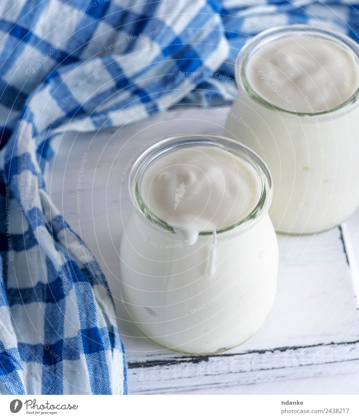 glass jars with homemade yogurt Food Yoghurt Dairy Products Nutrition Breakfast Diet Table Wood Fresh Blue White Greek healthy Napkin background Meal eat