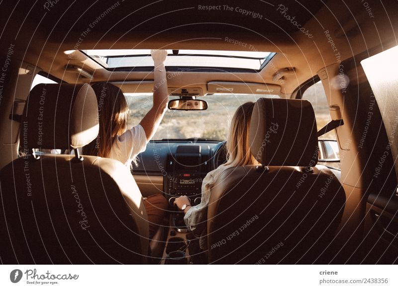 young women enjoying vacation in the car on road trip Lifestyle Joy Happy Beautiful Vacation & Travel Trip Summer Human being Woman Adults Friendship Nature