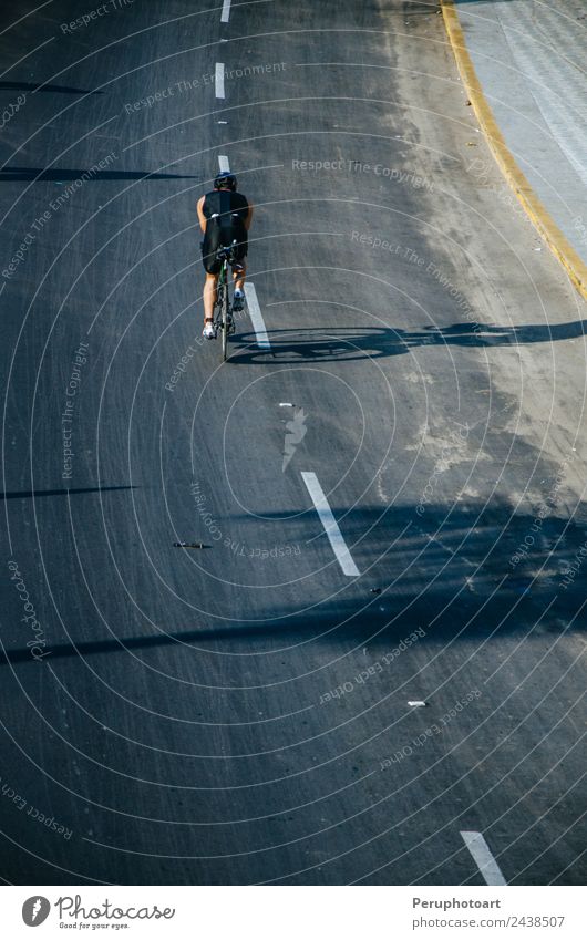 Cyclist on the road at full speed Vacation & Travel Adventure Beach Sports Cycling Woman Adults Nature Street Movement Fitness Athletic Speed Competition bike