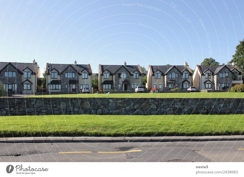 Series of identical houses near Dublin Environment Cloudless sky Horizon Summer Grass Garden Village House (Residential Structure) Detached house