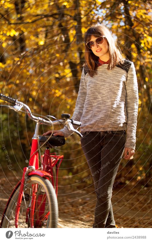 Young girl posing close to her bicycle. Lifestyle Leisure and hobbies Vacation & Travel Trip Garden Human being Feminine Young woman Youth (Young adults) Woman