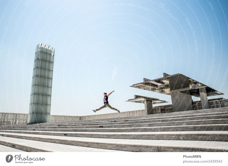 The Jump for Joy Lifestyle Feminine Young woman Youth (Young adults) Woman Adults 1 Human being 30 - 45 years Architecture Doha Qatar Arabia "Glass tower