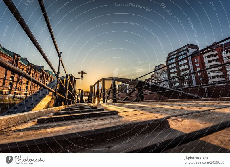 Bridge in the Speicherstadt Hamburg Twilight Evening Sunset Light Romance Brick Old warehouse district Germany World heritage Water Blue sky Cloudless sky