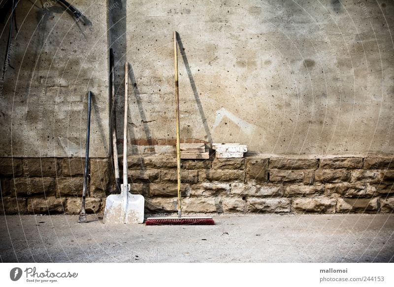 Shovel Broom Garden tools leaning against the wall Work and employment Gardening Construction site Retirement Closing time Tool Brown Gray Determination pause