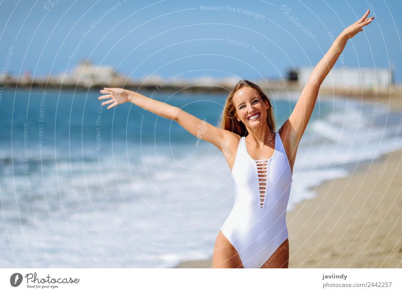 Young blonde woman on a tropical beach with open arms Beautiful Vacation & Travel Tourism Summer Beach Ocean Human being Feminine Young woman