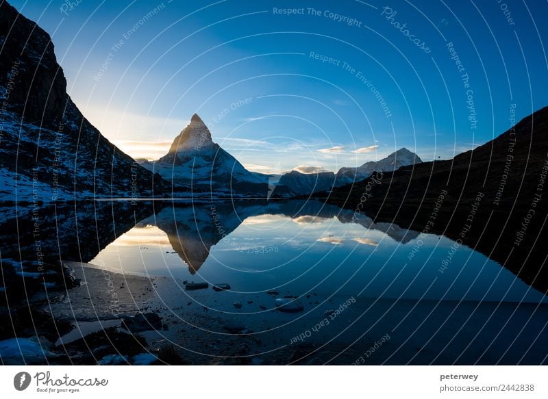 Matterhorn and Dente Blanche from Riffelsee mountain lake Trip Freedom Mountain Hiking Nature Sky Sunrise Sunset Alps Lake Blue Yellow Black Beautiful