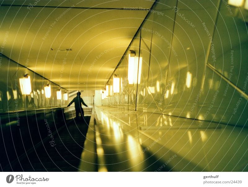 escalator Escalator Long Downward Man Green Light Underground Commuter trains Speed Haste Blur Depth of field Night Electrical equipment Technology Human being