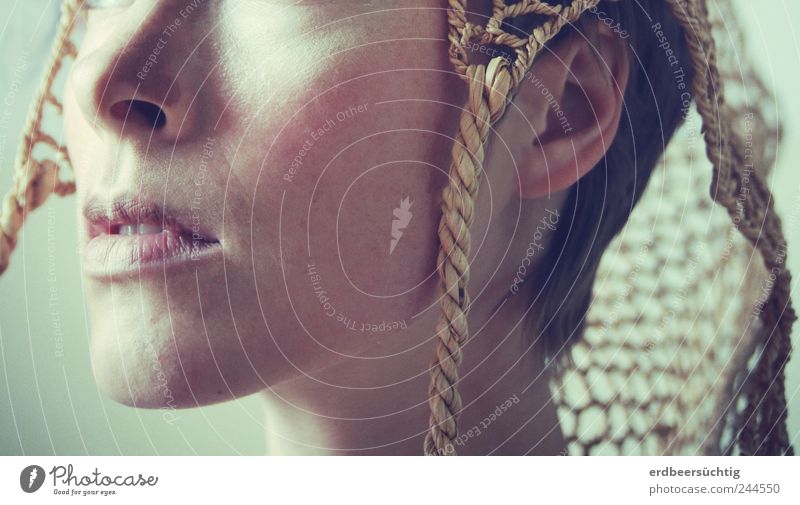 Gedankenstürmerin - cropped face of a short-haired woman in half profile with raffia headgear Feminine Androgynous Nose Mouth Hat Headwear Short-haired Breathe