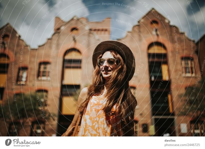 Long hair woman with hat and sunglasses visiting the city of Sydney with excitement. Lifestyle Style Joy Beautiful Body Leisure and hobbies Vacation & Travel