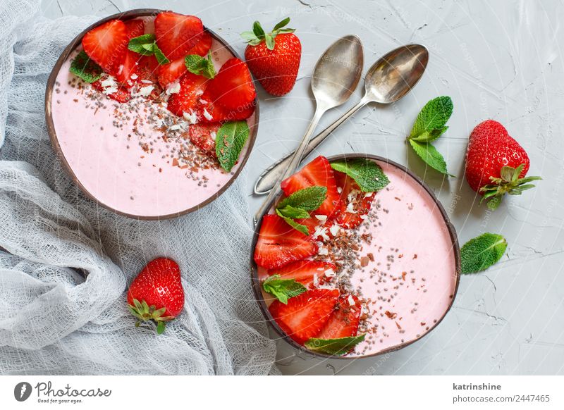 Strawberry smoothie bowls Yoghurt Fruit Dessert Nutrition Breakfast Vegetarian diet Diet Bowl Spoon Summer Fresh Gray Green Pink Red White background Berries