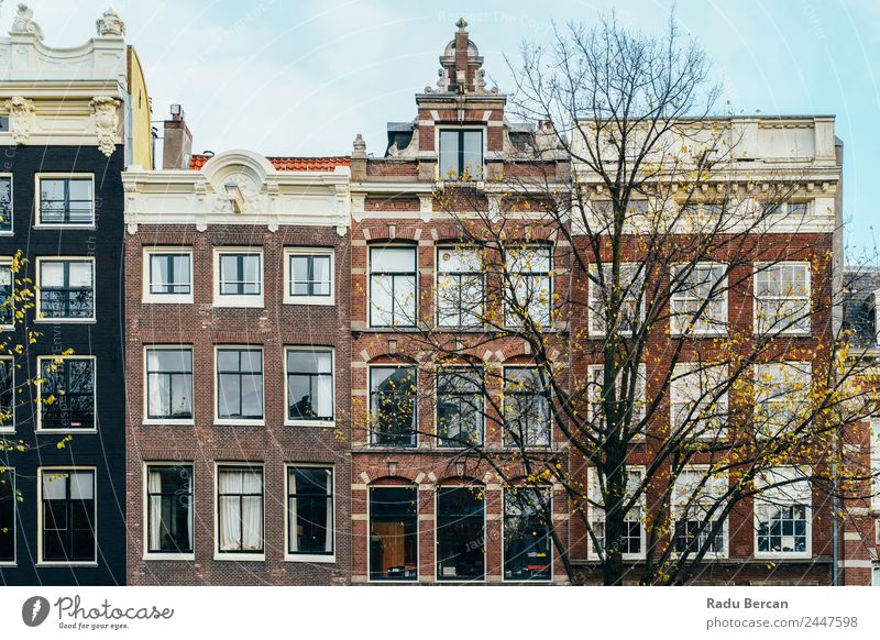 Beautiful Architecture Of Dutch Houses On Amsterdam Canal In Autumn canal Netherlands City House (Residential Structure) Famous building Vacation & Travel