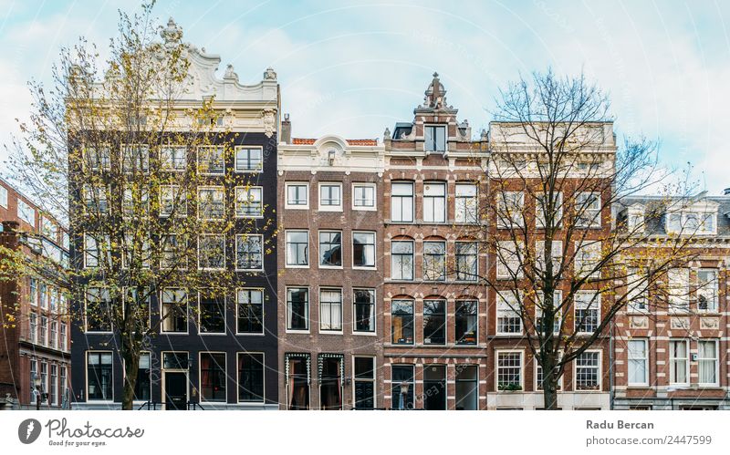 Beautiful Architecture Of Dutch Houses On Amsterdam Canal In Autumn canal Netherlands City House (Residential Structure) Famous building Vacation & Travel