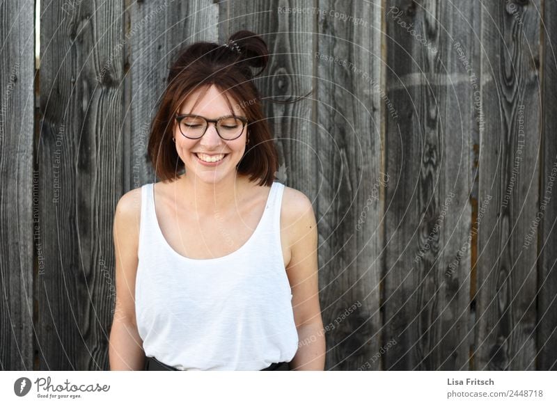 LOOKING AT THE FLOOR - YOUNG - GLASSES- WOOD Lifestyle pretty Feminine Young woman Youth (Young adults) 1 Human being 18 - 30 years Adults Wall (barrier)