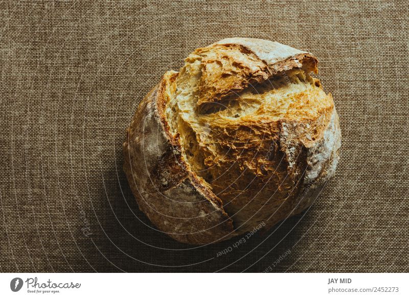 Freshly baked traditional bread on burlap tablecloth Bread Rustic Self-made Food Healthy Eating Food photograph Wheat loaf Brown whole Tradition Home-made