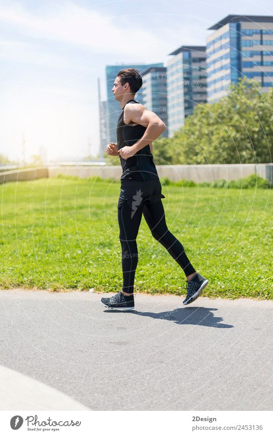 Attractive fit man running at sunset light Lifestyle Body Summer Sun Sports Human being Masculine Young man Youth (Young adults) Man Adults 1 18 - 30 years