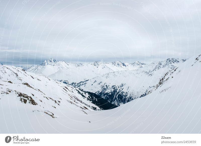 Arlberg | Austria Environment Nature Landscape Sky Winter Bad weather Ice Frost Snow Alps Mountain Snowcapped peak Dark Gigantic Gloomy Blue Gray Adventure