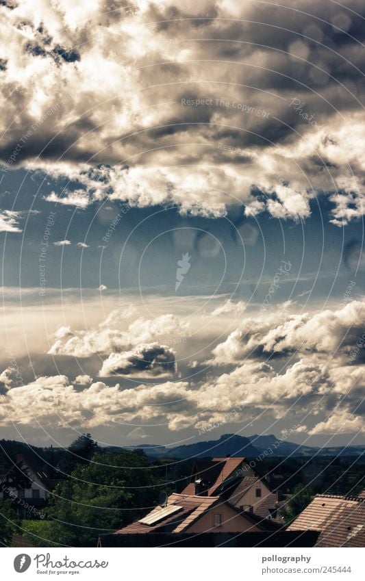 over the roofs... Summer Environment Nature Air Drops of water Sky Clouds Horizon Weather Beautiful weather Wind Thunder and lightning Hill Volcano Village