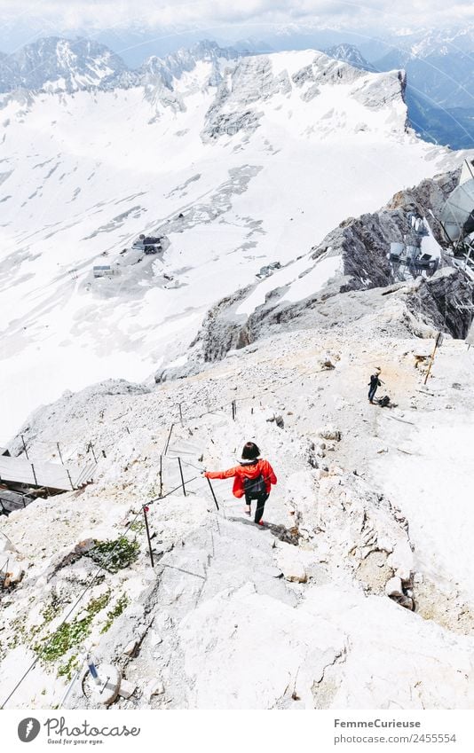 Hiker on the Zugspitze Feminine Young woman Youth (Young adults) Woman Adults 1 Human being 18 - 30 years 30 - 45 years Adventure Expedition Hiking Red Jacket