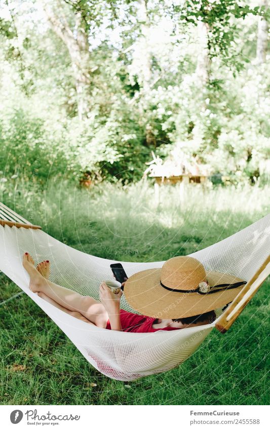 Young woman relaxing in a hammok Youth (Young adults) Woman Adults 1 Human being 18 - 30 years 30 - 45 years Nature Relaxation Garden Hammock Break Shadow