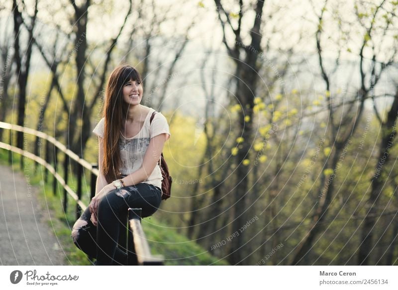 young woman enjoying her time getting fun outside in park Lifestyle Elegant Style Joy Happy Beautiful Hair and hairstyles Skin Face Cosmetics Cream Healthy