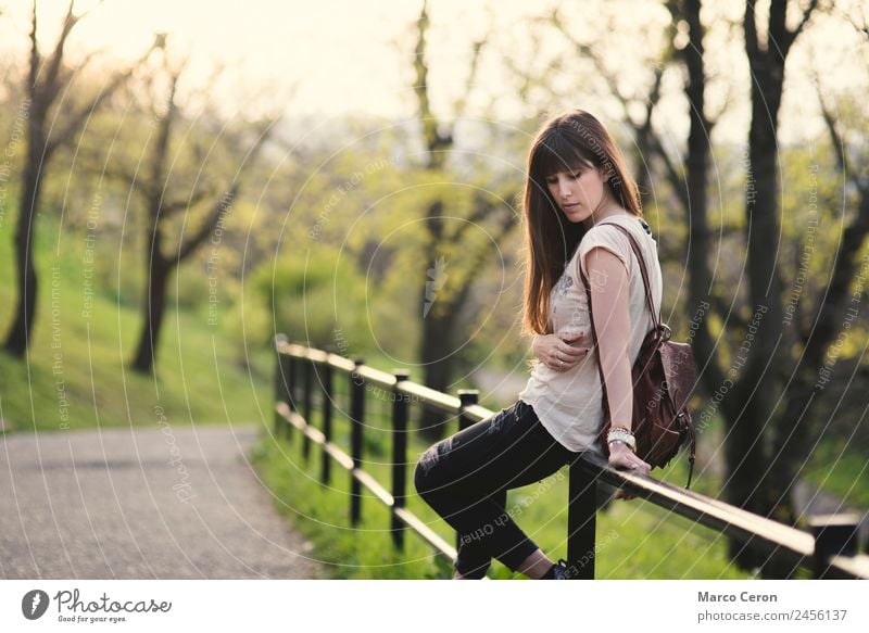 beautiful young woman enjoying her time outside in a park. Lifestyle Beautiful Hair and hairstyles Healthy Harmonious Relaxation Calm Meditation Fragrance