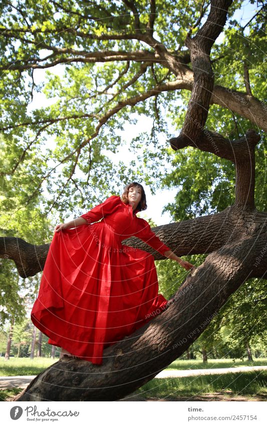 ulreka Feminine Woman Adults 1 Human being Beautiful weather Tree Park Dresden Dress Brunette Long-haired Observe Movement To hold on Looking Stand Free