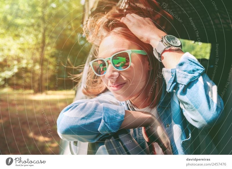 Happy young woman looking through the window car Lifestyle Joy Beautiful Relaxation Leisure and hobbies Vacation & Travel Trip Summer Human being Woman Adults