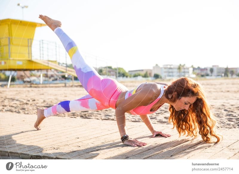 Woman practicing yoga on the beach in Barcelona Lifestyle Wellness Well-being Relaxation Meditation Vacation & Travel Tourism Summer Summer vacation Beach