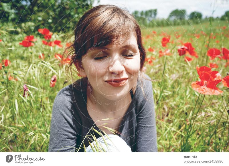 Young happy woman enjoying a sunny day in nature Lifestyle Style Joy Healthy Wellness Well-being Relaxation Human being Feminine Young woman