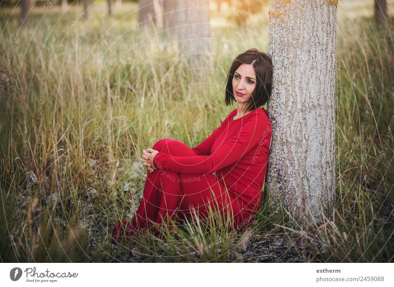 thoughtful woman sitting in the forest Lifestyle Elegant Style Beautiful Wellness Relaxation Vacation & Travel Freedom Human being Young woman