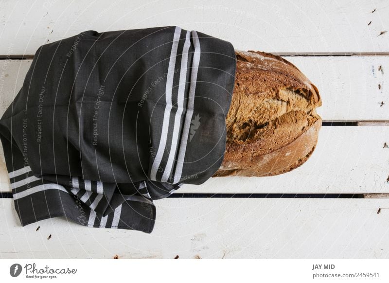 rustic bread, wrapped in striped fabric Food Bread Nutrition Breakfast Organic produce Vegetarian diet Diet Group Cloth Fresh Brown White Tradition breads