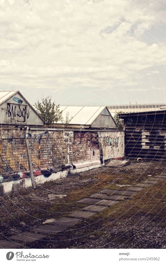 Abyss above the roofs [E.T.] Outskirts Industrial plant Wall (barrier) Wall (building) Old Dark Ghetto Backyard Places Derelict Unkempt Graffiti Youth culture